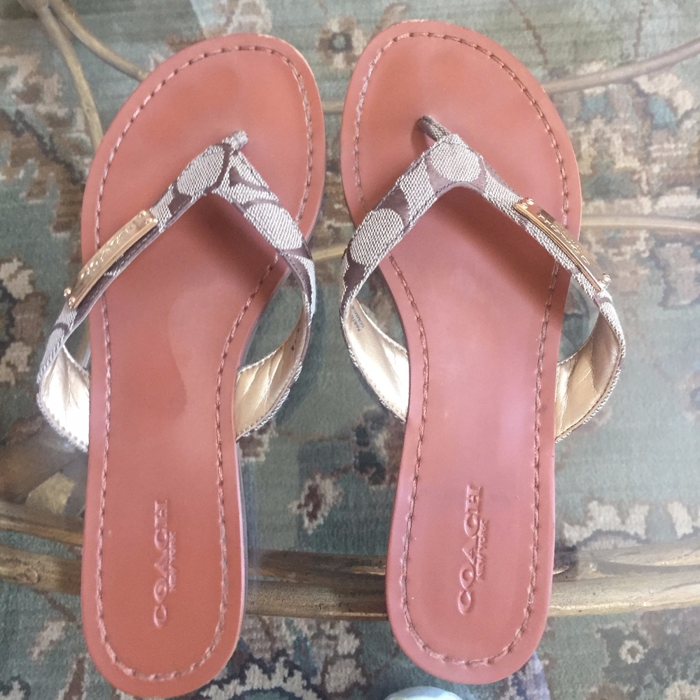 Coach flip flops with gold logo